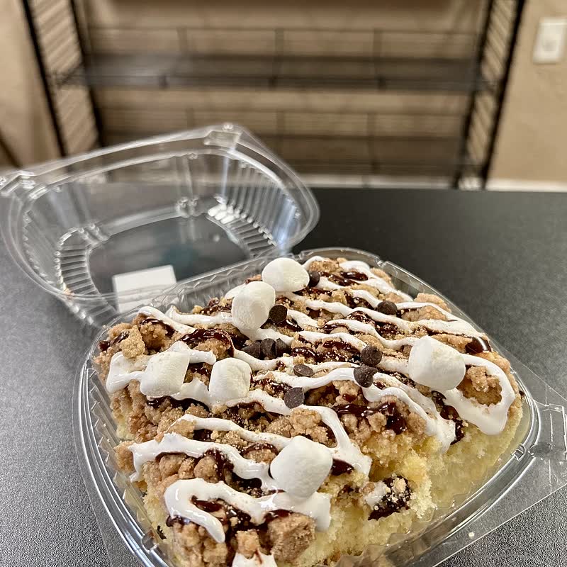 A gluten-free s&rsquo;mores crumb cake with marshmallow, chocolate drizzle and chocolate chips